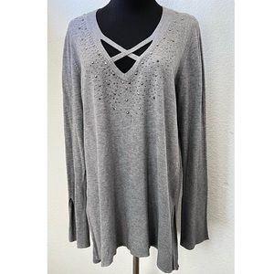 Slouchy long sweater with criss-cross neckline